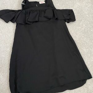 New with tags! Black shift dress with cut out shoulders. Size M.